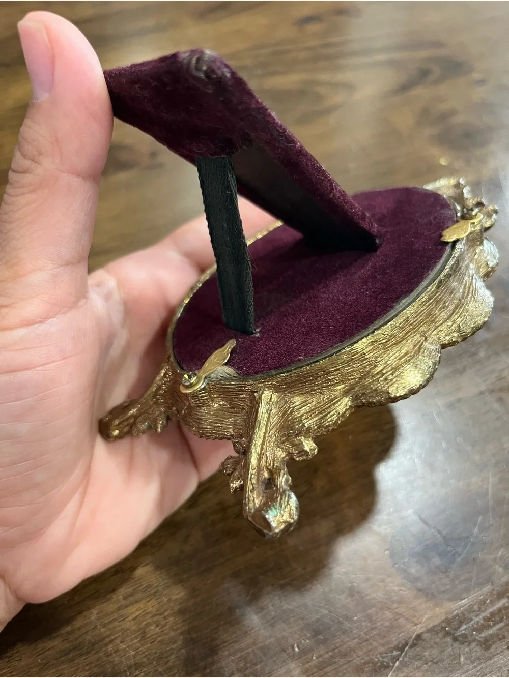 Vintage gold plated oval frame with glass.